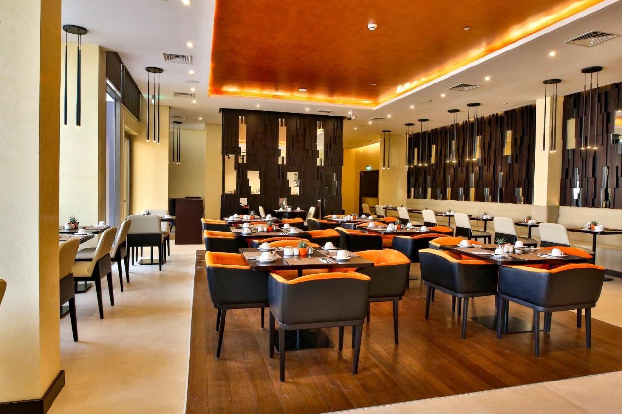 Four Points By Sheraton Production City, Dubai Exterior photo